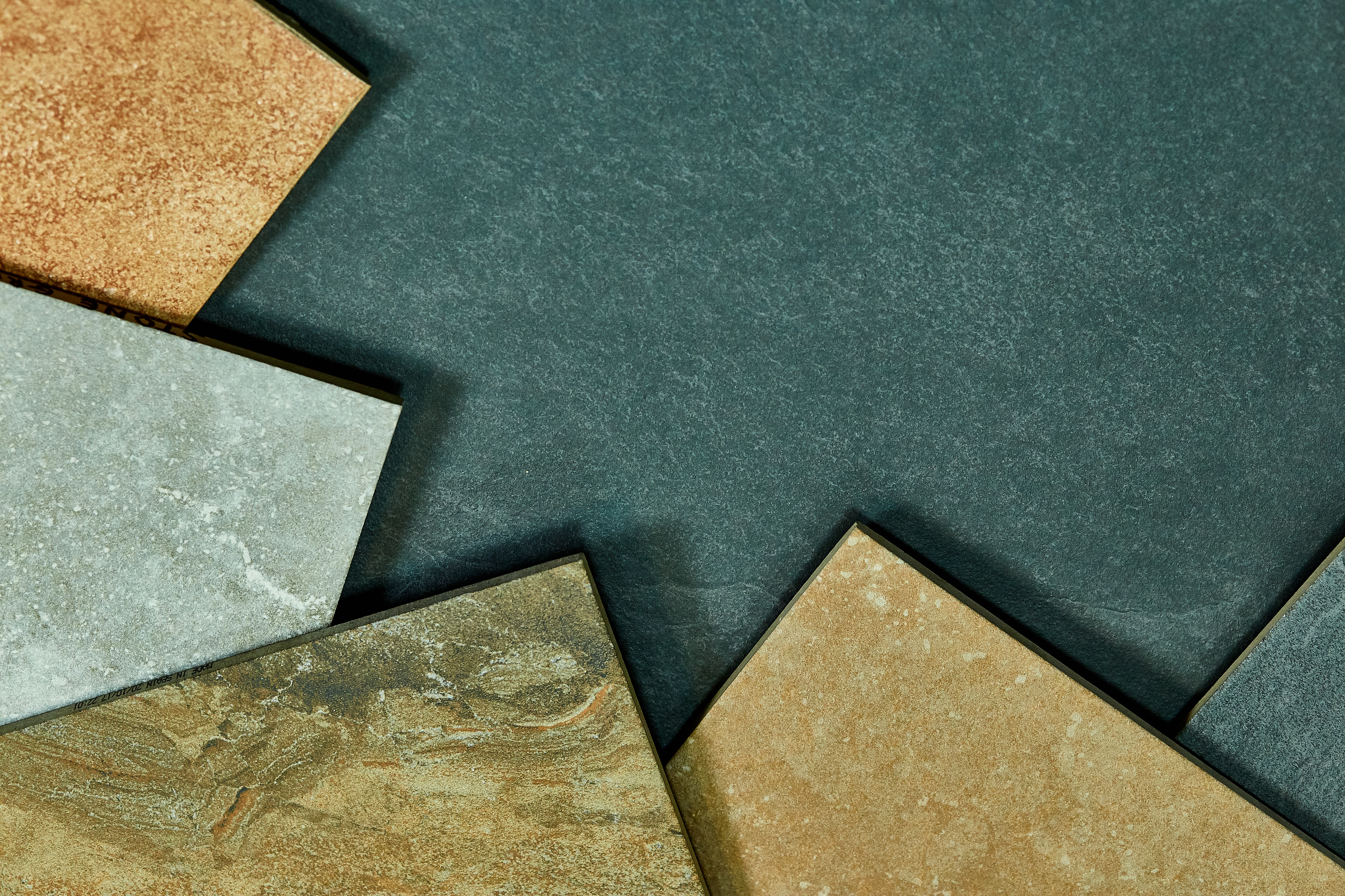 Tile surface preparation and underlayment